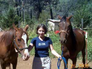 Katrina poses with her horses